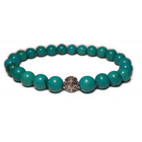 Le bracelet avec perles de turquoise bleu